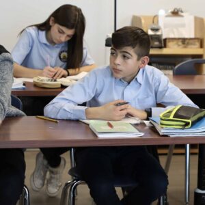 Two students at their desks.